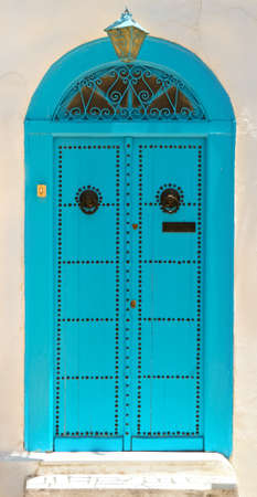 Door of Sidi Bou Said. La Gulett, Tunisia. White and blue townの写真素材