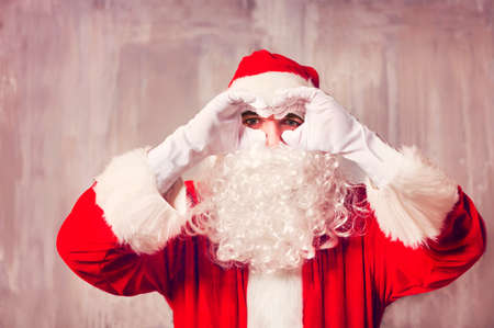 Photo of happy Santa Claus with looking at cameraの写真素材
