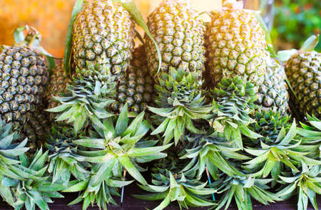 Pineapple tropical fruit on the market. Backgroundの写真素材