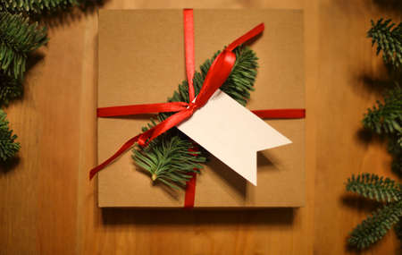 Christmas presents laid on a wooden table background. Cristmas concept