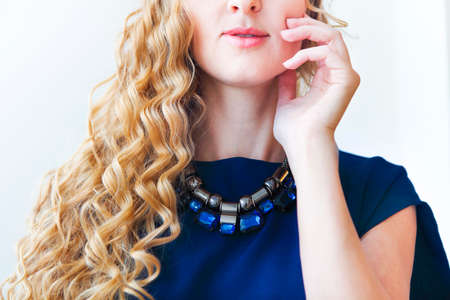 Close up portrait of the beautiful blond girl with long hairの写真素材