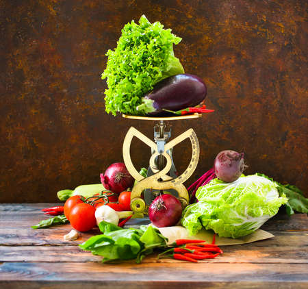 Autumn vegetables on wooden background. Organic food and healthy eating conceptの写真素材