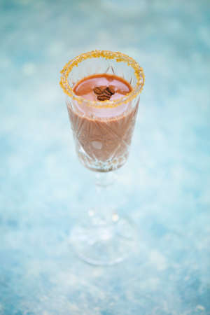 Alcohol cocktails on the turquoise background. Close upの写真素材