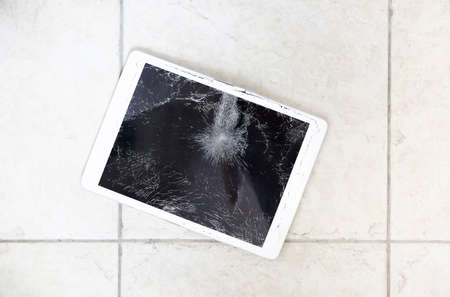 Damaged or broken tablet computer lcd display on the floor