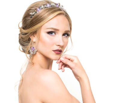 Young pretty girl with hairstyle and makeupの写真素材