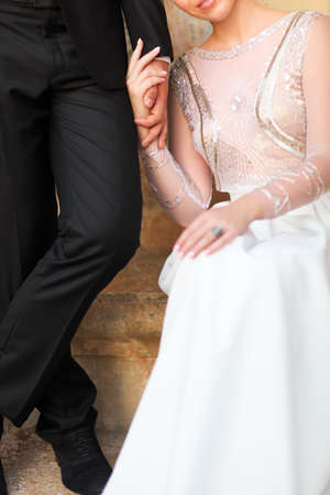 Young bride and groom outdoors on wedding ceremonyの写真素材