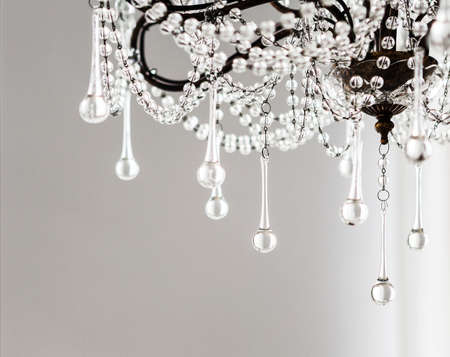 Contemporary crystal chandelier in room interior. Close upの写真素材