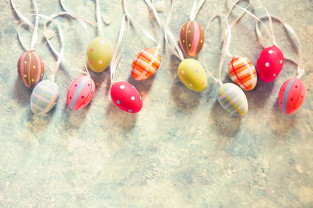 Easter background with Easter eggs. Top view with copy space の写真素材