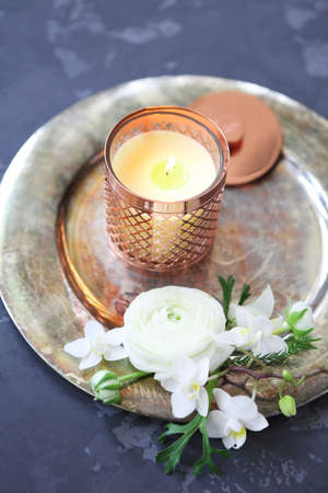 Festive invitation card with beautiful flowers and tray on the dark backgroundの写真素材