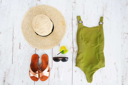 Beach accessories on white wooden background. Summer vacations conceptの写真素材