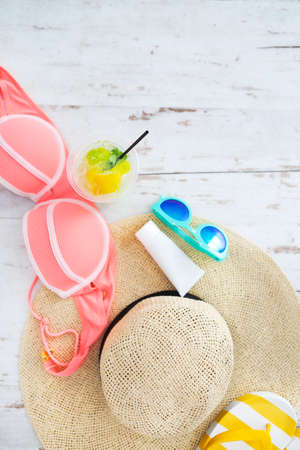 Beach accessories on white wooden background. Summer vacations conceptの写真素材