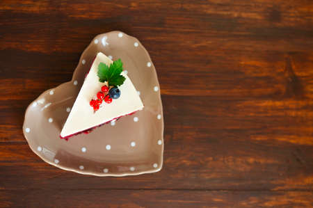 Red Velvet Cake decorated with cheese cream and berriesの写真素材