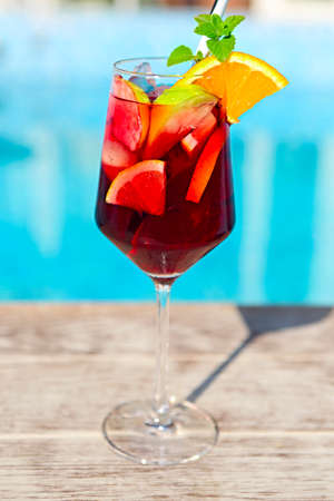 Refreshing classic fruit sangria (punch) by the poolの写真素材