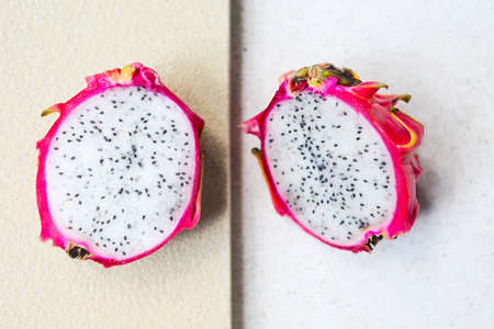 Sliced dragon fruit on the light background. Close up. Top viewの写真素材