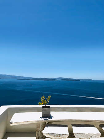 Picturesque view from terrace of calm blue sea under blue cloudless sky in summerの写真素材