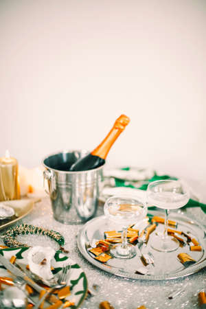 Christmas And New Year Holiday Table Setting With Champagne. celebration. Place setting for...