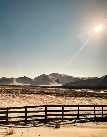 Beautiful empty paved road to Lake Baikal. Winter landscape. Travel and holiday conceptの写真素材