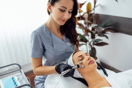 Cosmetology light equipment. Anti age and wrinkle. Microcurrent medicine treatment. Portrait of a...