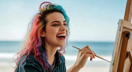 Vibrant young artist with multicolored hair is painting on canvas at the beach, enjoying the creative process and the beautiful coastal scenery, AI generatedの素材