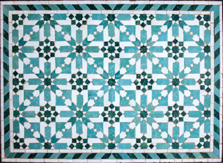 Detailed geometric tile pattern with vibrant blue, green, and white colors, highlighting artistic...