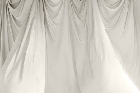 Elegant fabric drapes with soft folds create a calming ambiance, perfect for backgrounds or artistic displaysの写真素材