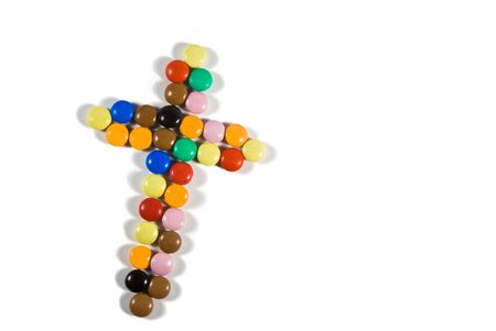 Peaster varicoloured cross on white background