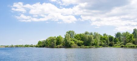 River on background blue sky with cloudの写真素材