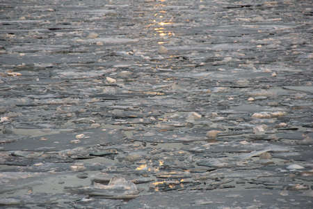 Winter ray of light in clear water