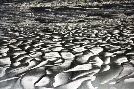 Ice on spring sunny river go outの写真素材