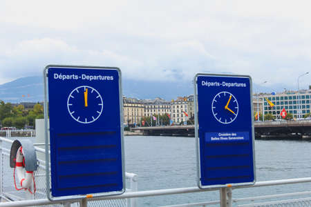 Elegant ship pier in Geneva on lake at cloudy autumn day, october 8, 2013の写真素材