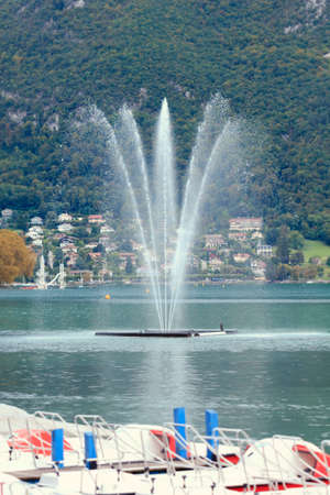 Beauty fountain on lake Geneva in Annecy, Franceの写真素材
