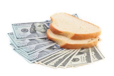 Dollar bill and two pieces of white bread isolation on white background