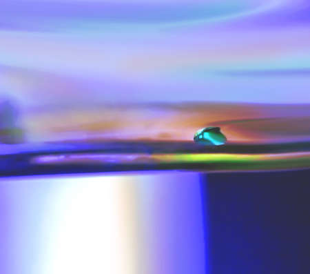 Abstract background with water drop at multicolours 
