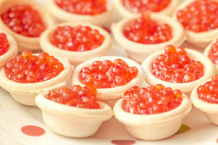 Beauty fresh canape with red caviar for party