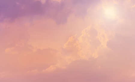Beauty clouds in pink sky with sunの写真素材
