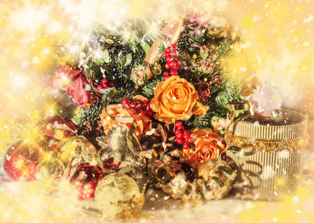 Festive bright Christmas composition with nice bouquet and tree toysの写真素材