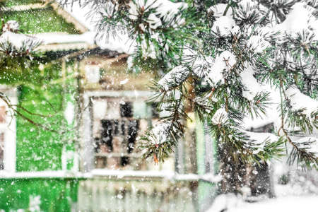 Old abandoned house in snow winter dayの写真素材
