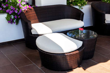 Wicker furniture in lounge area for relax at day