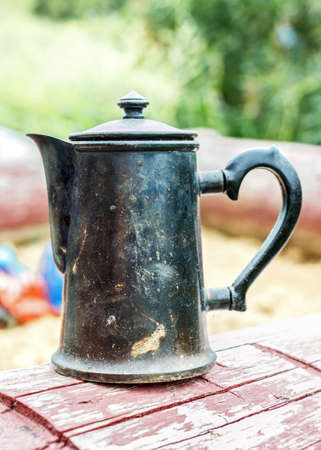 Style old metal coffee pot in retro