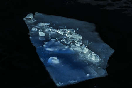Great winter ice floes in blue and dark halftonesの写真素材