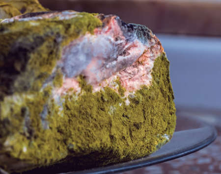 Real powerful green mold on bread like symbol of dangerous
