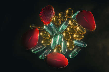 Real transparent capsules and strawberries on dark background for good mood and healthの写真素材