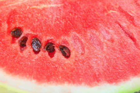 Amazing flesh of ripe juicy pink watermelon for yummy eatingの写真素材