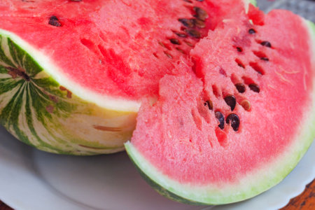 Real nice fresh slices of ripe red watermelon for yummy eatingの写真素材