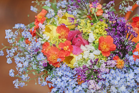 Charming variegated multicolored bouquet of spring flowers for good mood and inspirationの写真素材