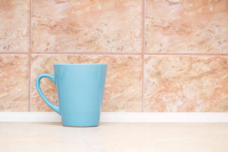 blue circle on the background of marble tilesの写真素材