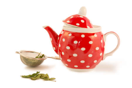 red kettle and tea leavesの写真素材