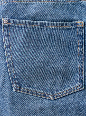 Jeans pocket texture close up, Jeans pants isolated on white background, blue denimの写真素材