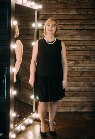 Portrait of happy beautiful aged womanの写真素材