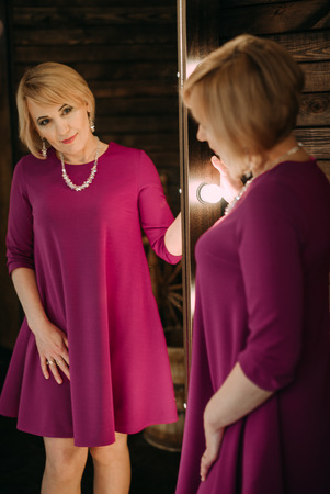 Portrait of happy beautiful aged womanの写真素材